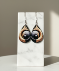 Artistic earrings displayed elegantly